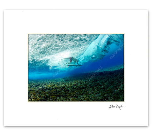 Hawaii Photographer Zak Noyle underwater with surfer