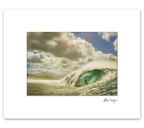 Image of a surfer riding a wave at Pipeline