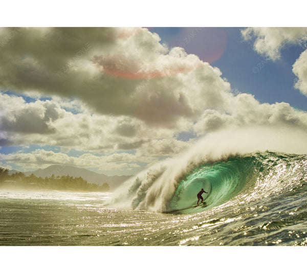 Zak Noyle captures a lone surfer on the wave of the day