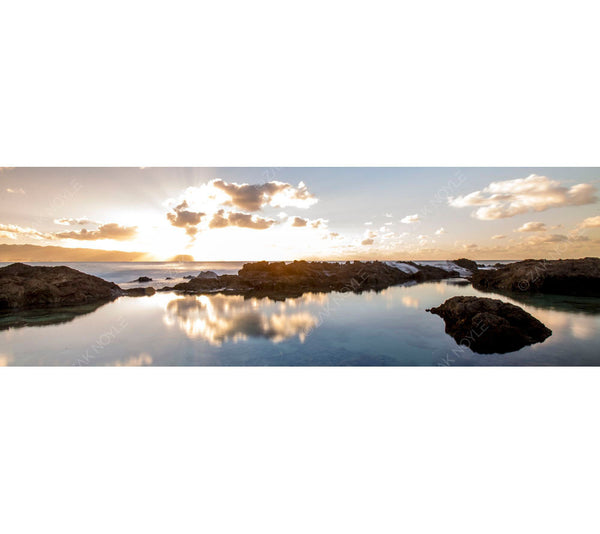 Panoramic photo of sunset on the North Shore of Oahu