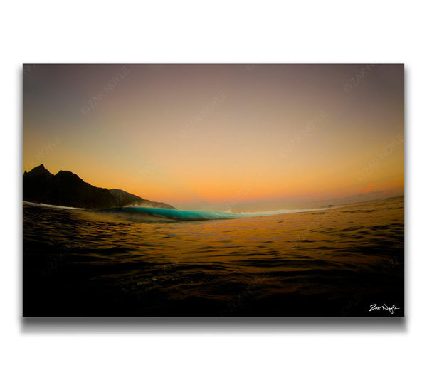Sunrise image of wave in Tahiti