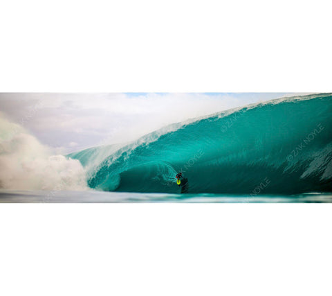 Photo of a surfer at Teahupoo in Tahiti