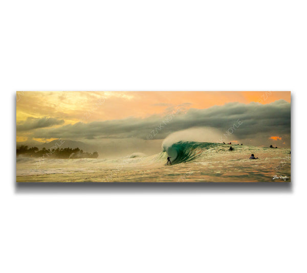 Image of surfers in the water at Pipeline on the North Shore of Oahu