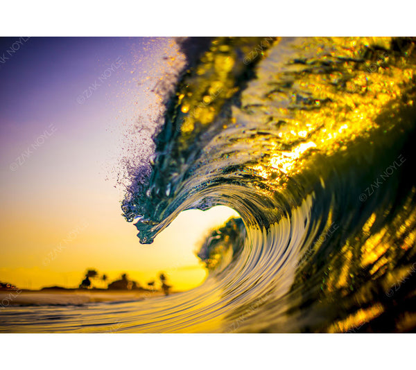 Image of a wave at sunrise 
