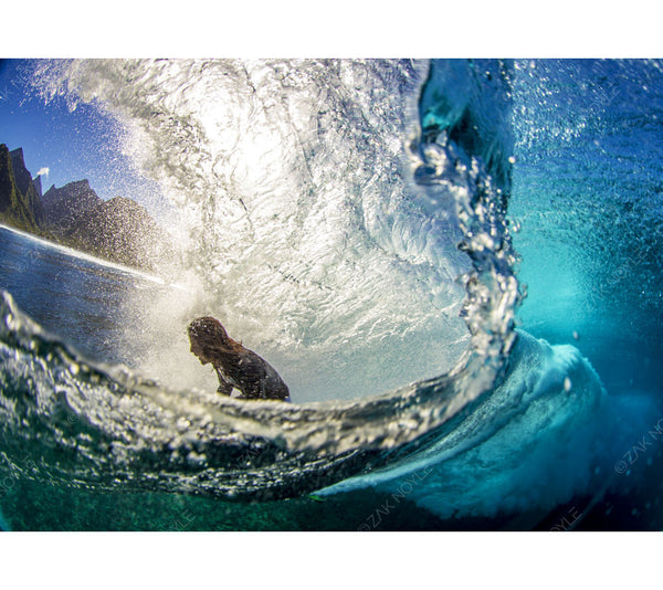 Image of a surfer in Tahiti